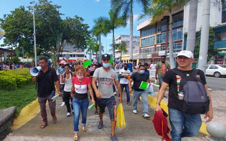 Migrantes marchan en Tapachula para exigir atención del INM